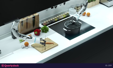 Robotic hands prepare soup. Cut the mark, throw it into boiling water.