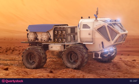 The Martian rover is moving on the surface of Mars. The base of the colonists in the background. 4k footage