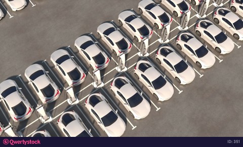 Parking electric cars, recharging with electricity. The camera will fly up.