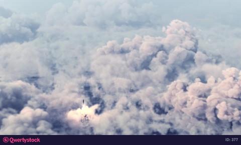 Combat nuclear missile takes off through the clouds. 3d animation