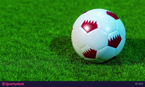 A soccer ball rolls out on the green grass. Close-up. 3D rendering.