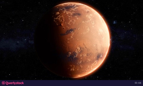 Traveling to the red planet Mars in space. The day/night terminator is visible as the Mars rotates.